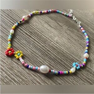 Free People Bohemian Colorful Beaded Necklace with Flower Accents.
